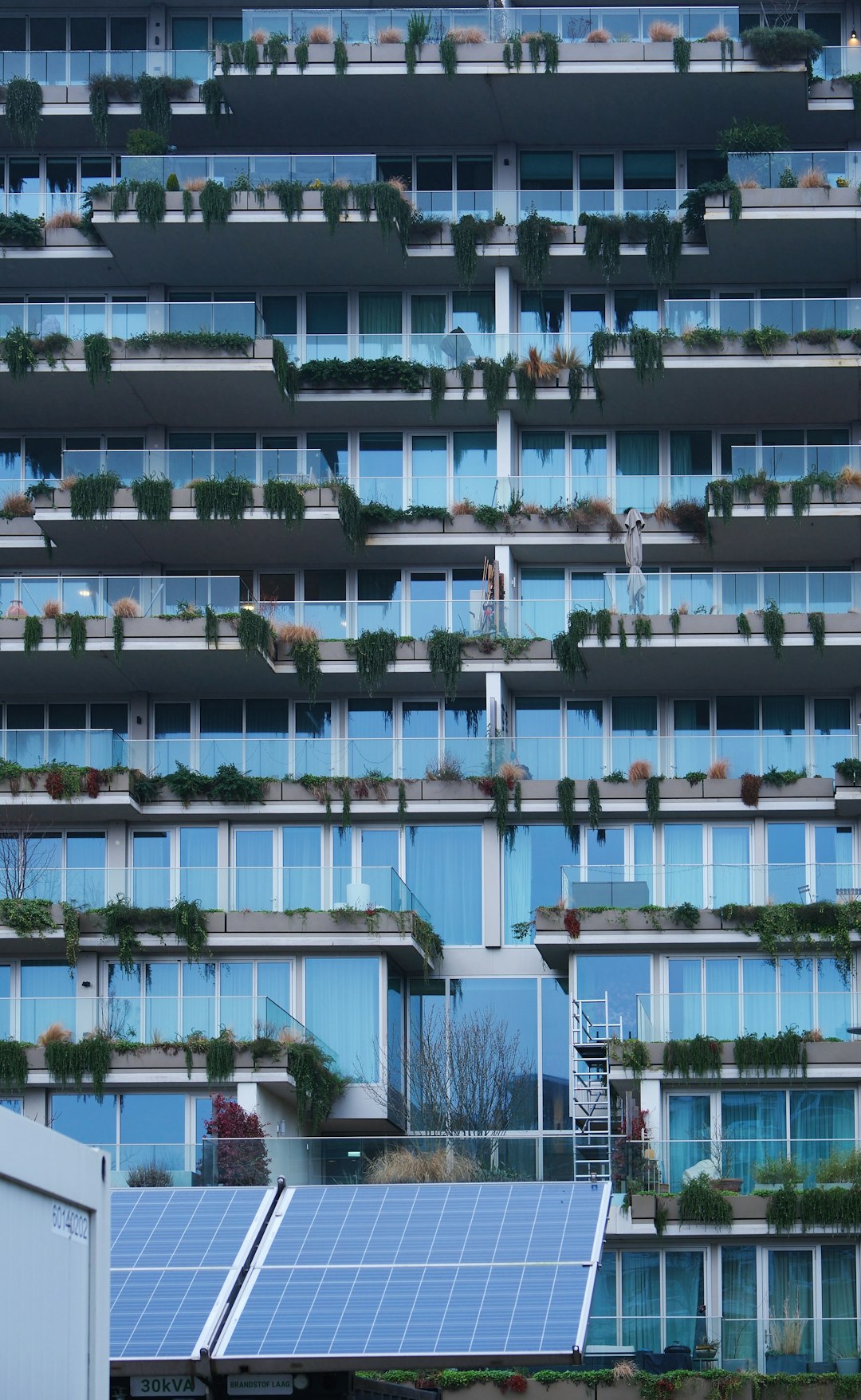 The Art of Drawing Readers In: Your attractive post title goes here Modern building and solar panels, Amsterdam
